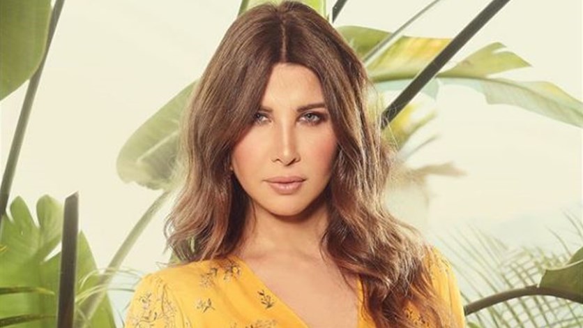 نانسي عجرم في عمادة طفلتها.. صورة كشفت ملامح ليا وتعليق ...