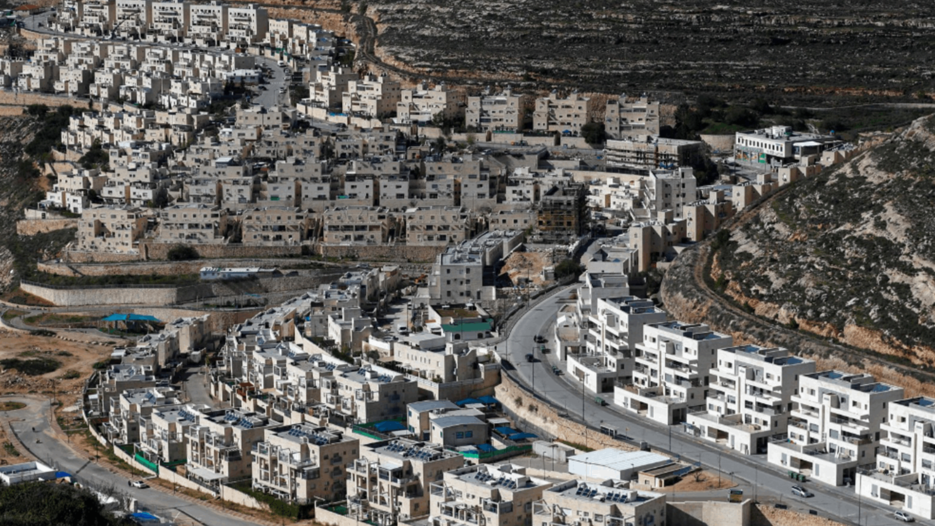 Israeli forces kill teacher, gunman in W.Bank raid, Palestinians say