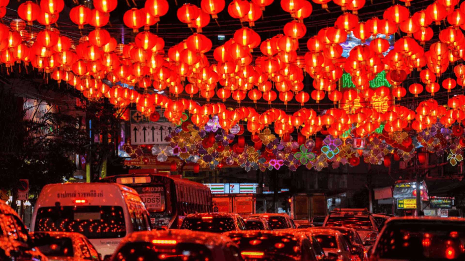 For Chinese Lunar New Year tourists, retailers roll out rabbit dances, red lanterns