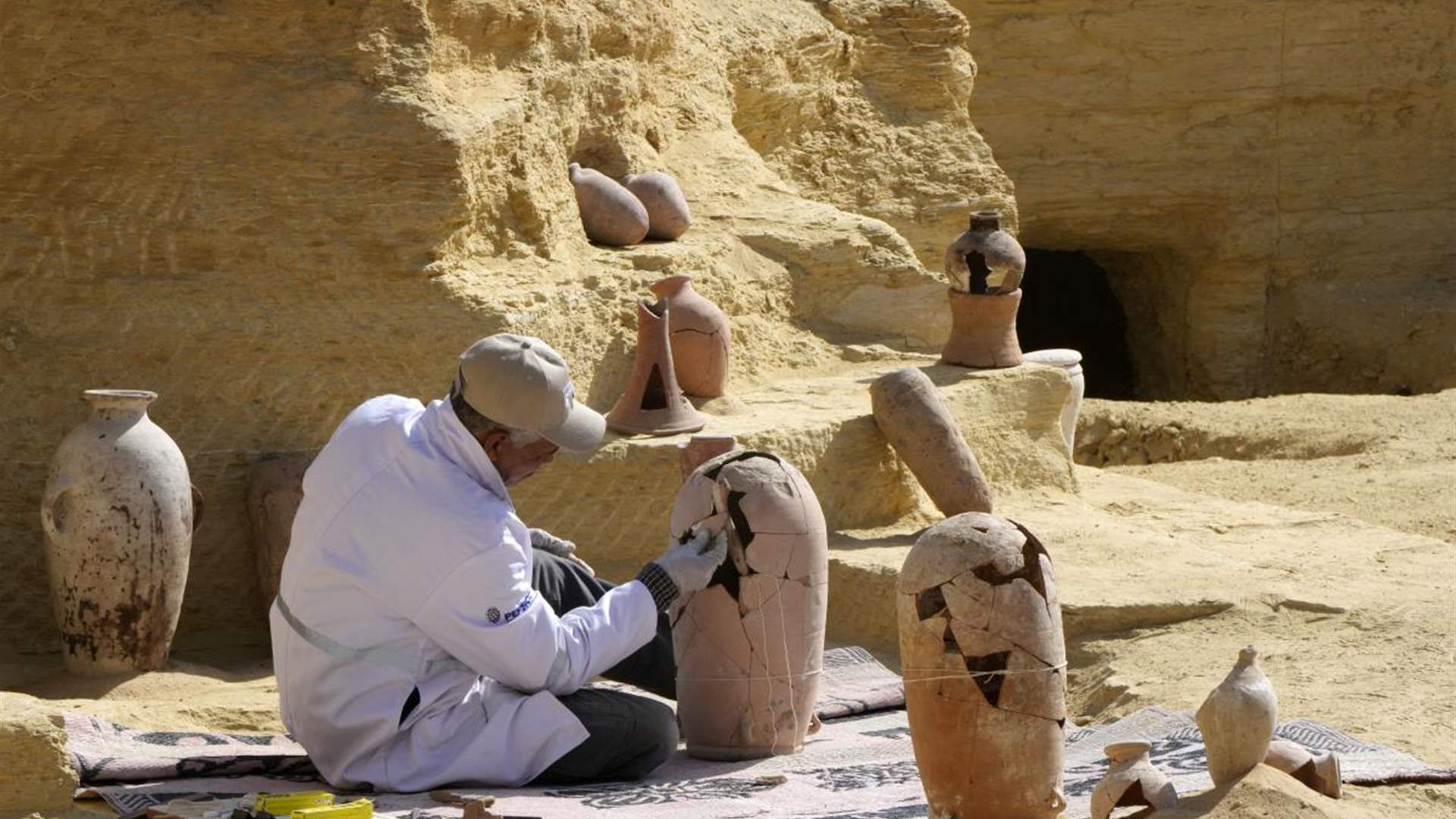 Egypt unveils tombs and sarcophagus in new excavation