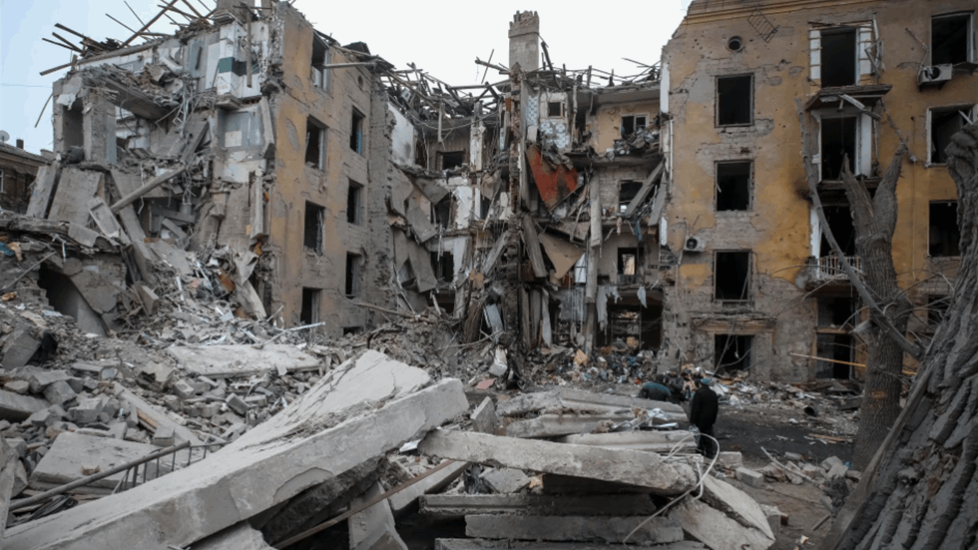 Russian missile wrecks apartment block, killing 3, as EU leaders visit Kyiv