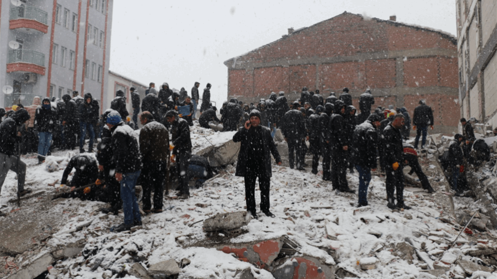 Families beg for help to find loved ones in snow-covered earthquake debris