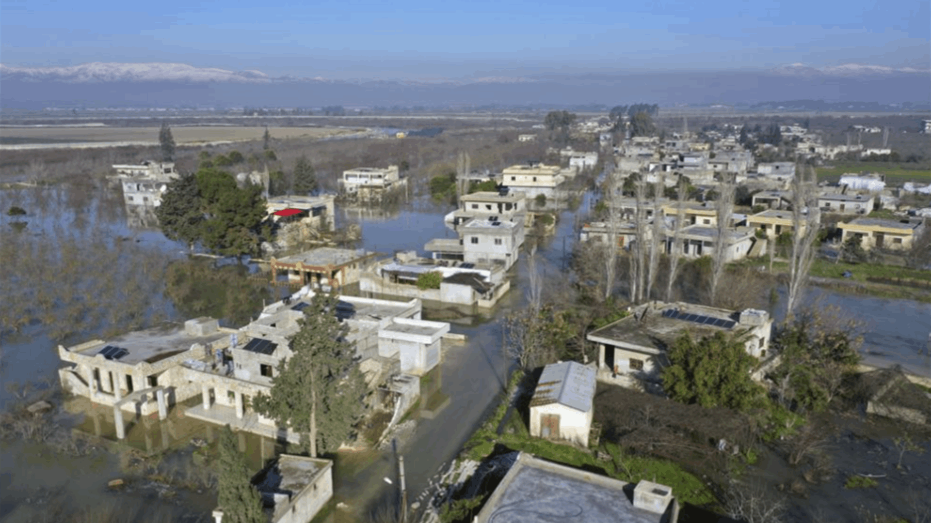 Days after quake, aid trucks reach northwest Syrian enclave