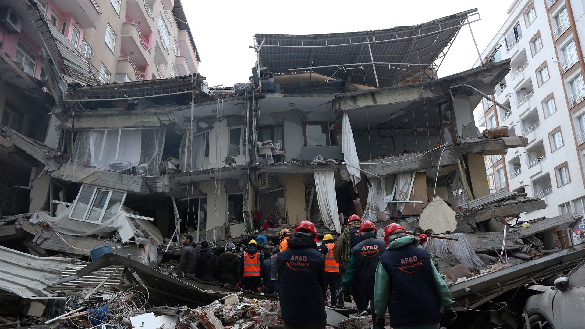 Earthquake death toll tops 33,000, Turkey starts legal action