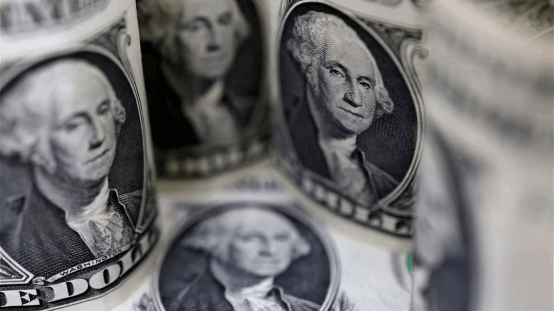 Dollar edges lower from six-week peak