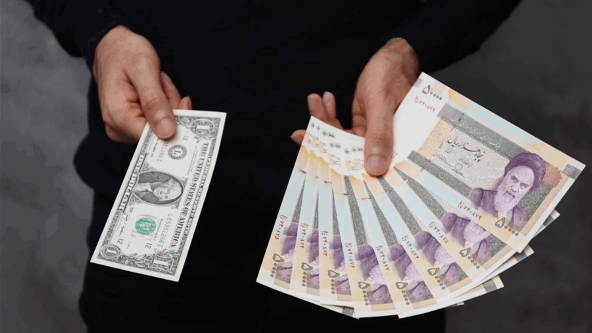 Iran's currency falls to record low as sanctions to continue