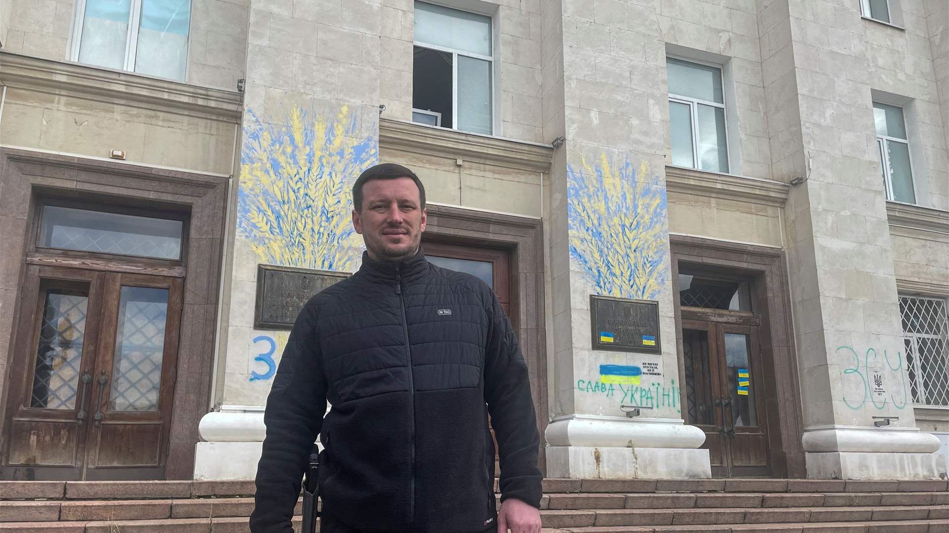 Despite dashed hopes, some in Ukrainian city Kherson refuse to leave