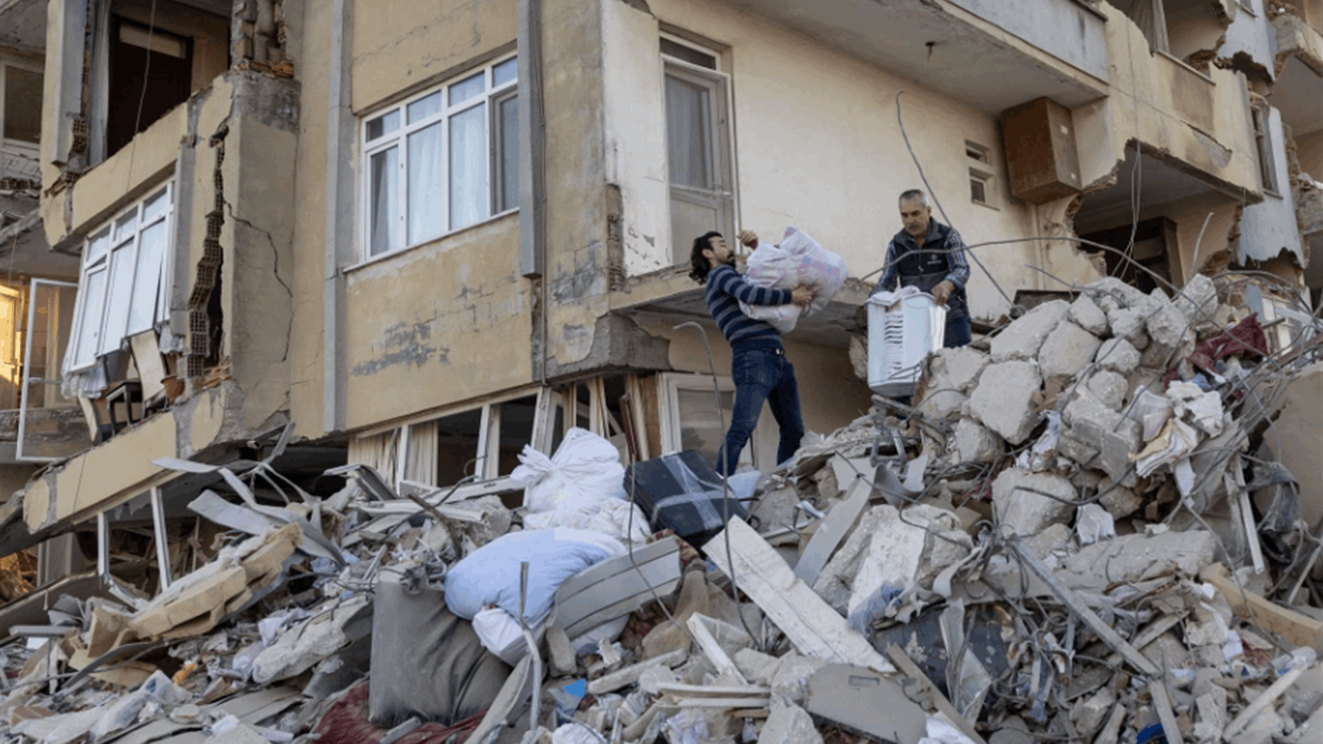 Turkey steps up rebuilding plans as quake toll nears 50,000