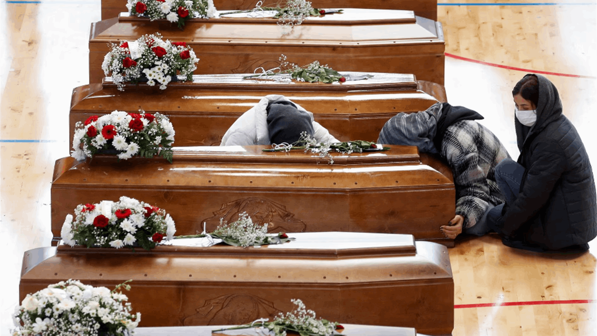 Relatives pay respects as toll from Italy migrant boat wreck rises to 67 