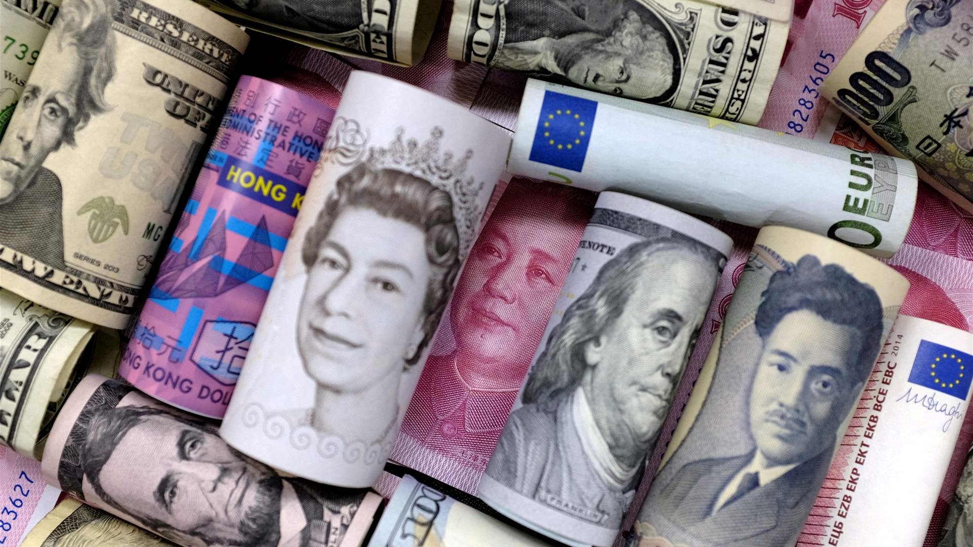 Dollar slips, yuan gains on China PMI; hot inflation lifts euro
