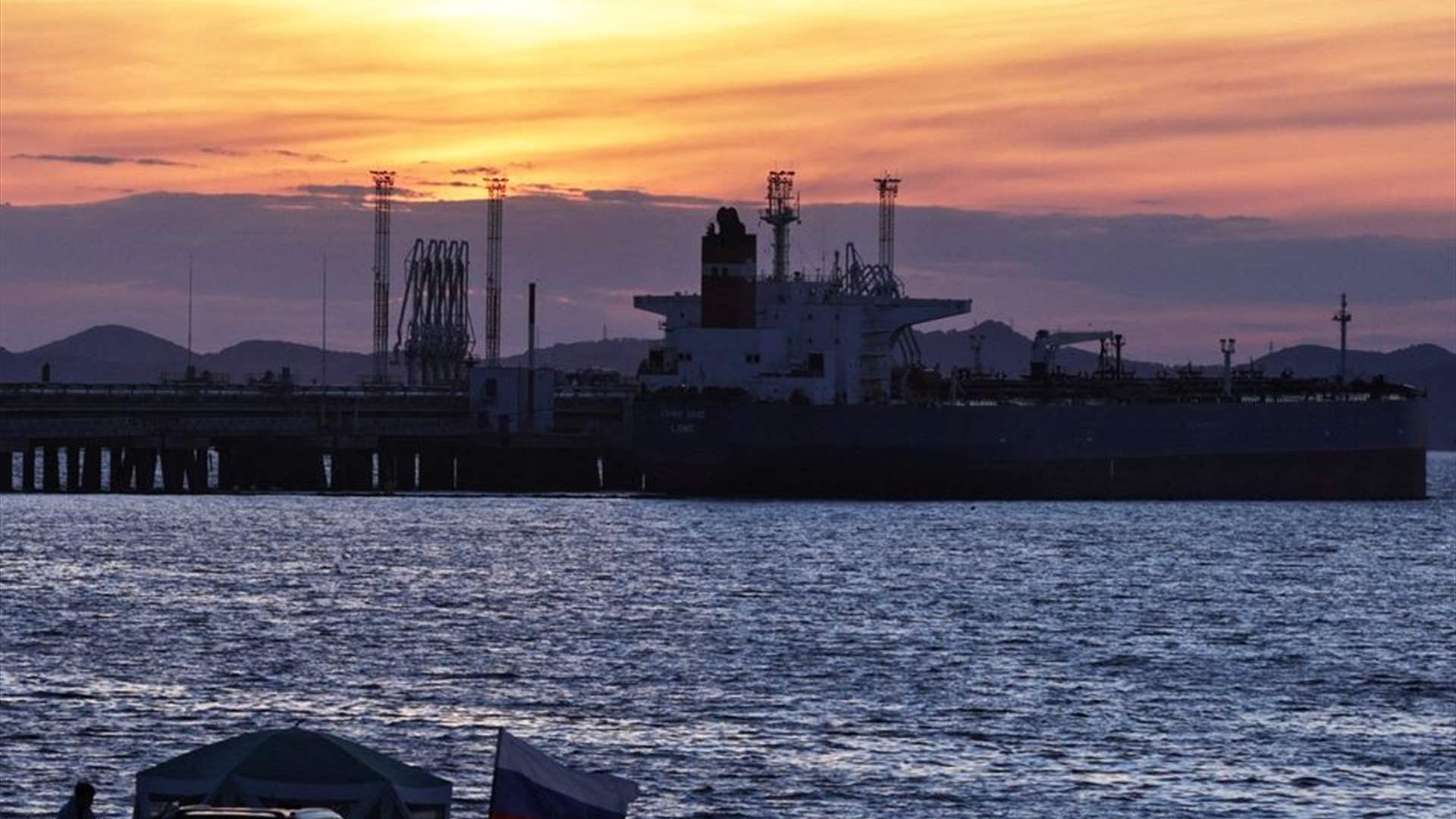 Oil gains on China growth, but European inflation weighs 