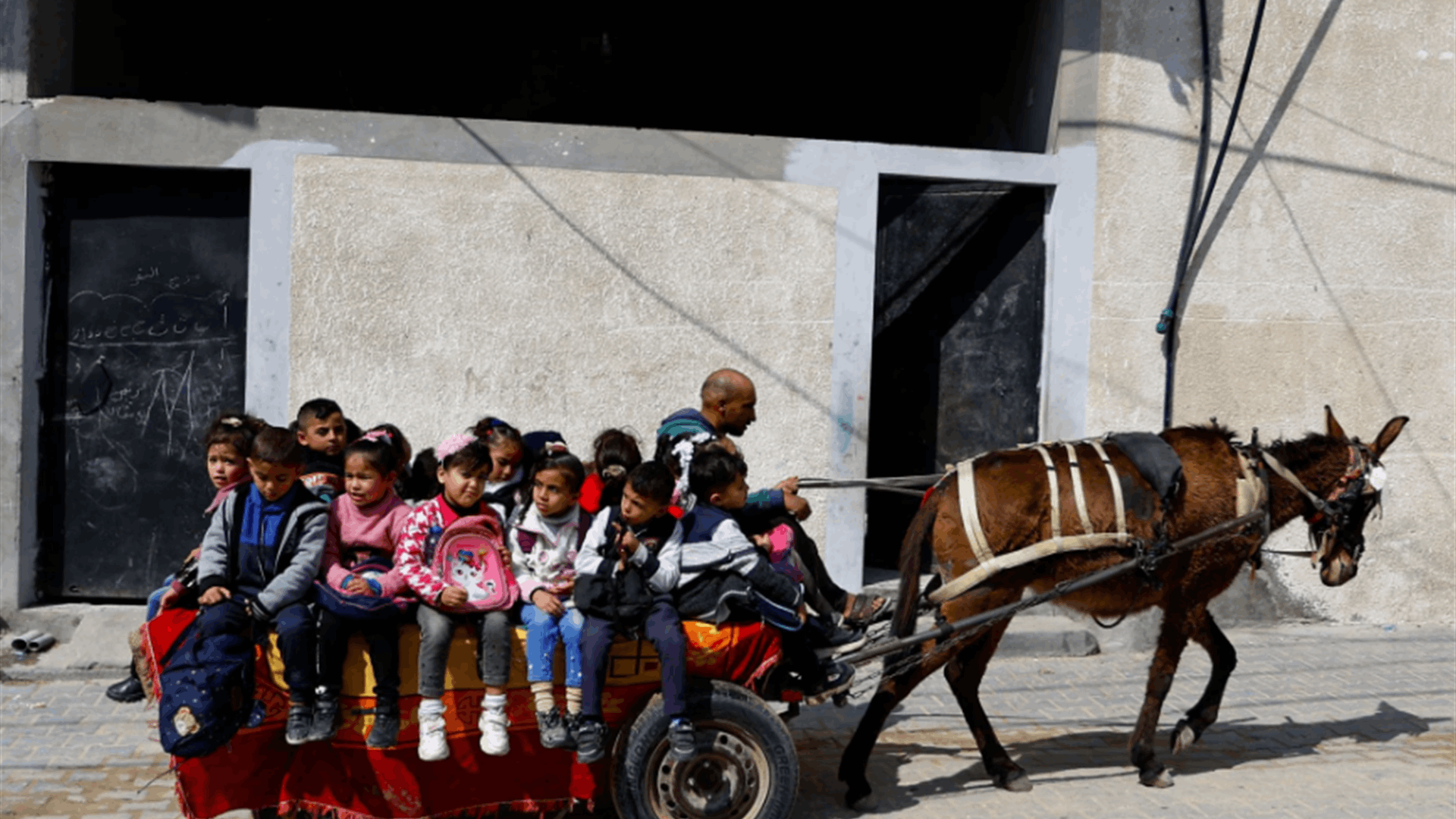 For some Gaza kids, a donkey cart is the only way to class