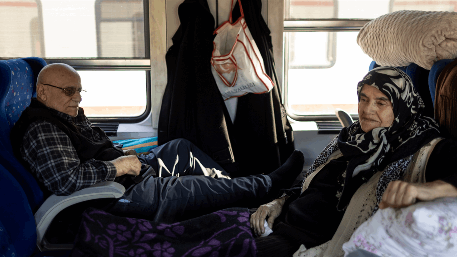Turkish families shelter on a train after earthquake brought life to a standstill