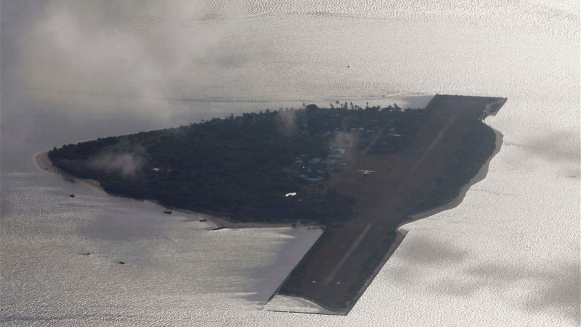 Philippines says Chinese navy ship spotted near disputed island