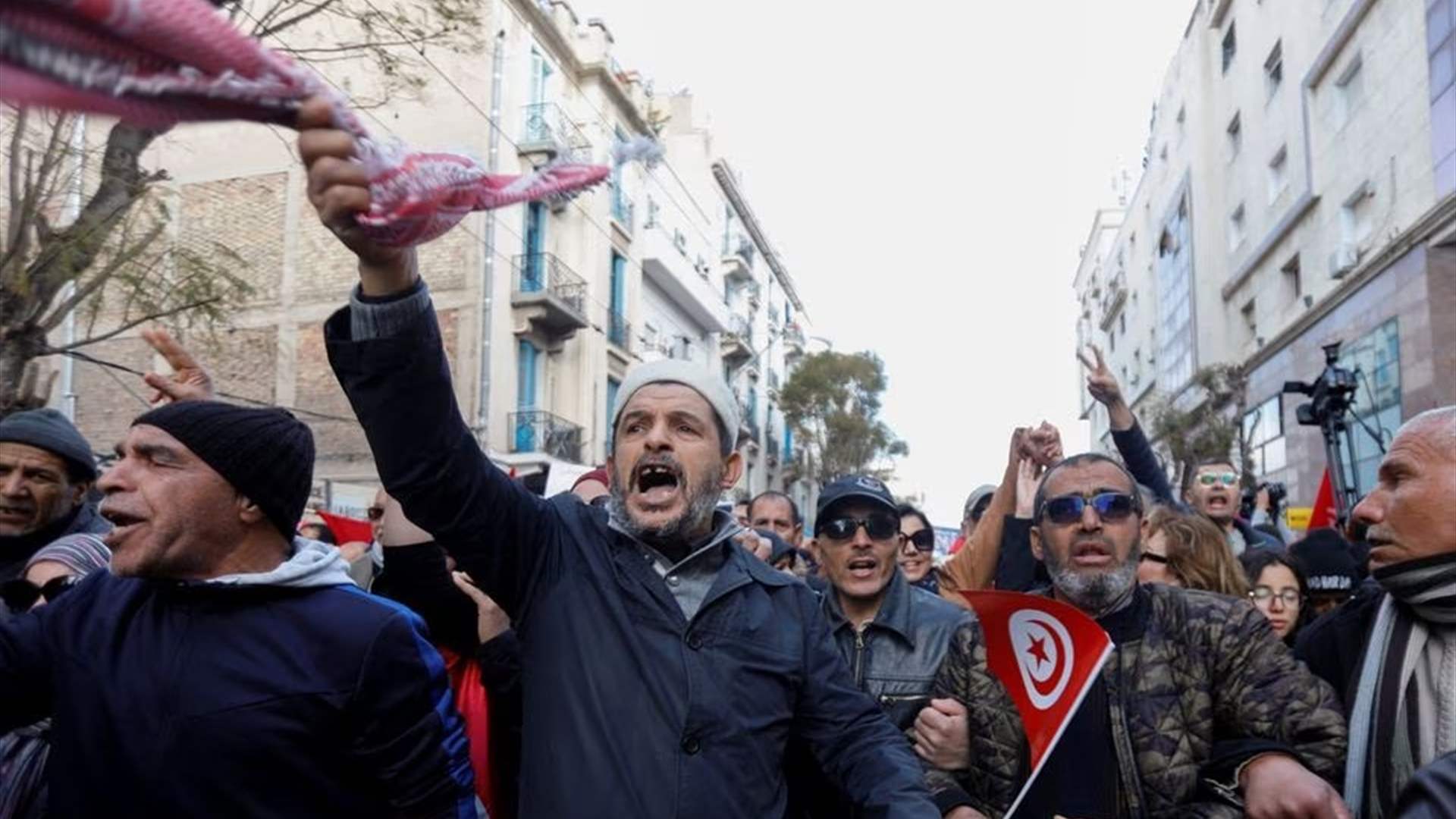 Tunisian opposition defies protest ban with rally
