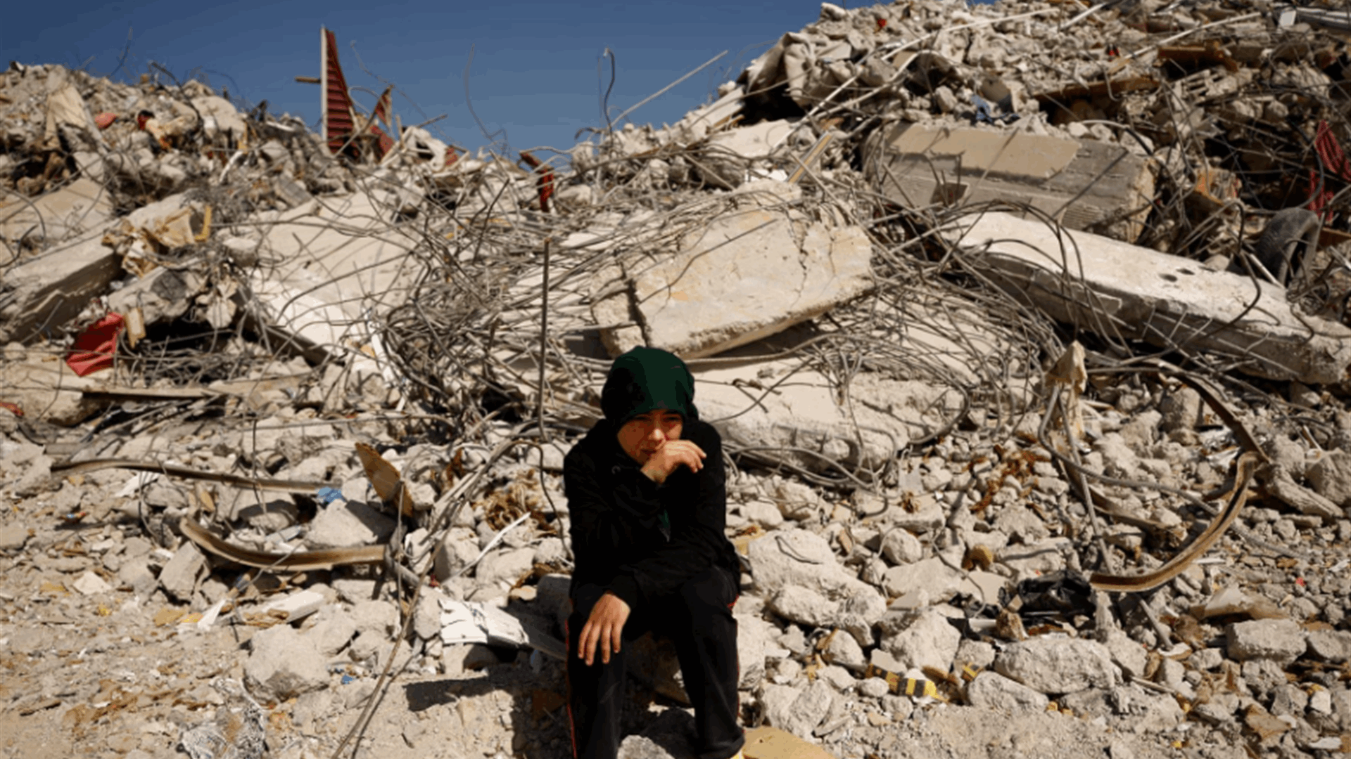 A month after quake, family that survived under the rubble looks to the future