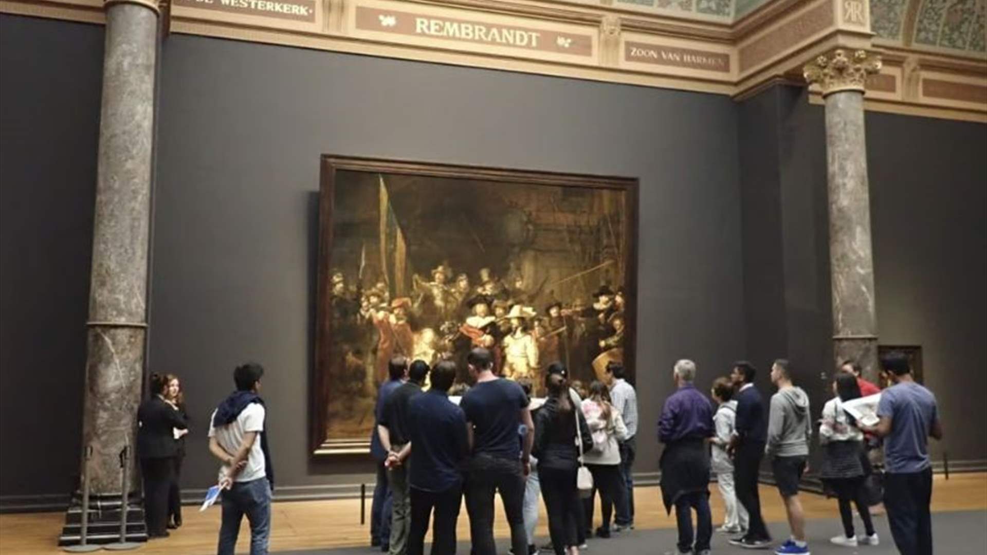 Extinction Rebellion holds climate protest next to Rembrandt's The Night Watch