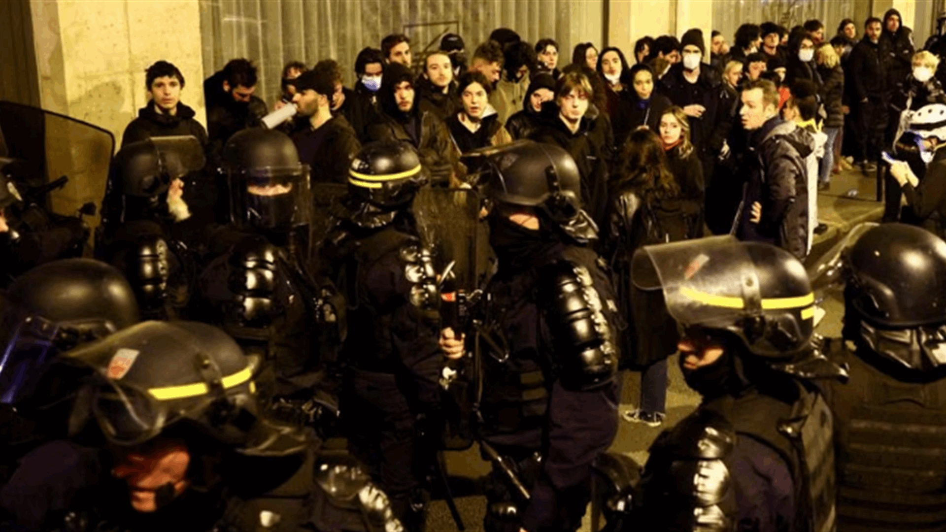 Dozens arrested in French protests after government survives no-confidence vote