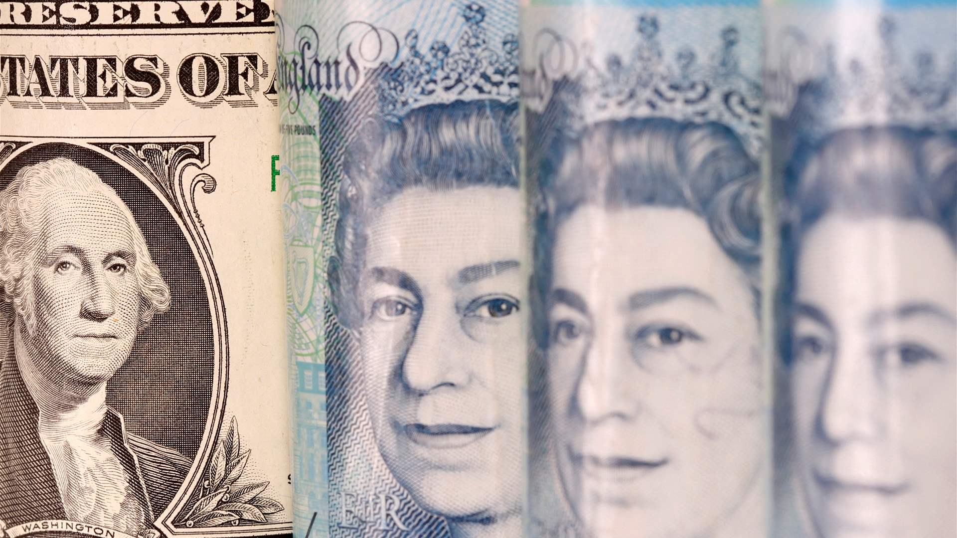 Dollar pauses, sterling drops ahead of Fed, BoE