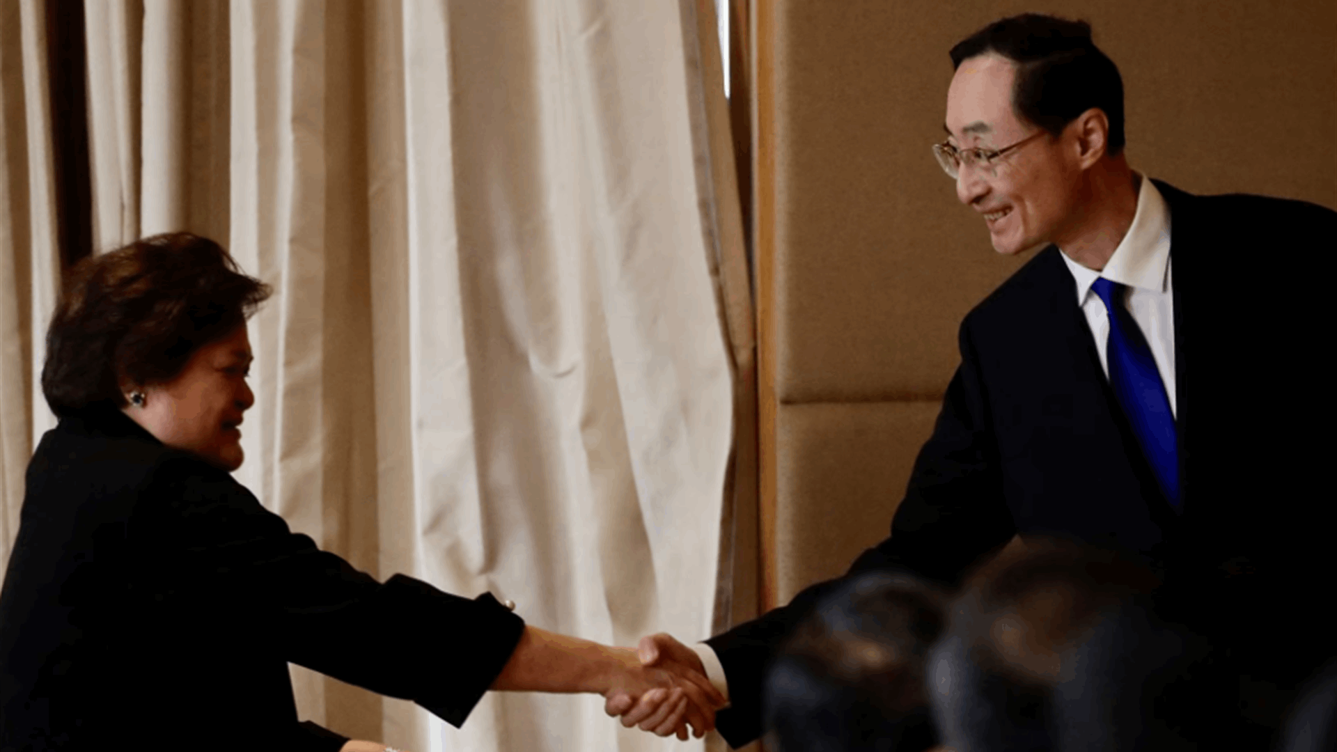 Philippines, China say to address maritime issues peacefully