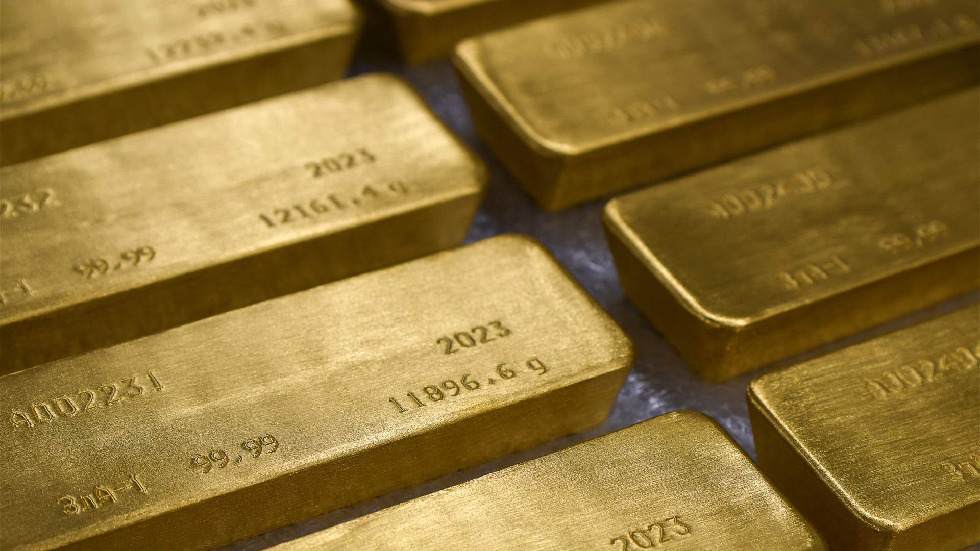 Gold slips 1% as equities gain, investors assess banking risks