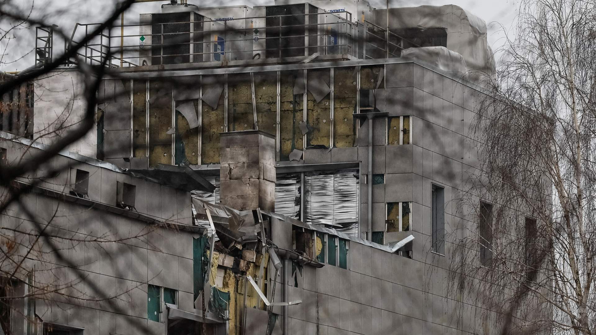 Ukraine says it downs drones over Kyiv, debris sets shop ablaze