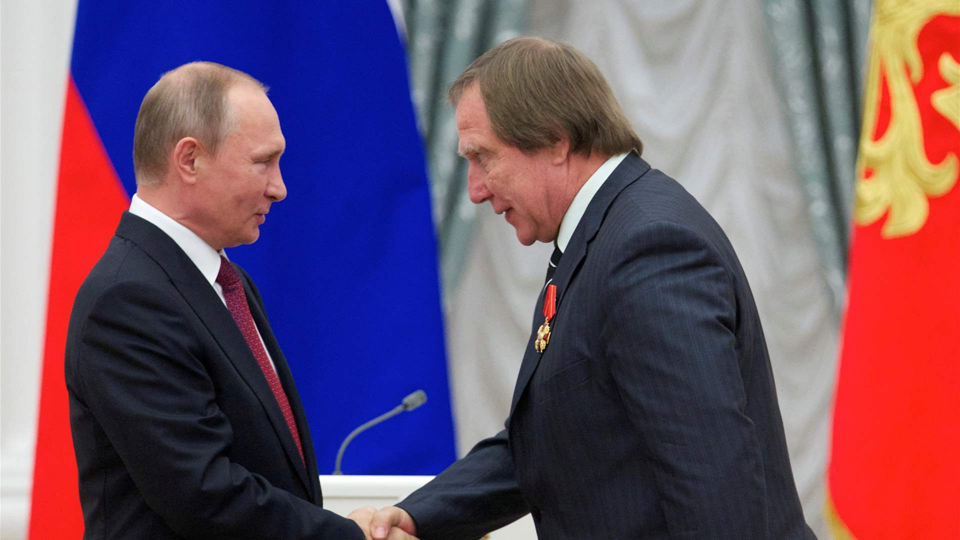 Four bankers who helped Putin's friend set up Swiss bank account convicted