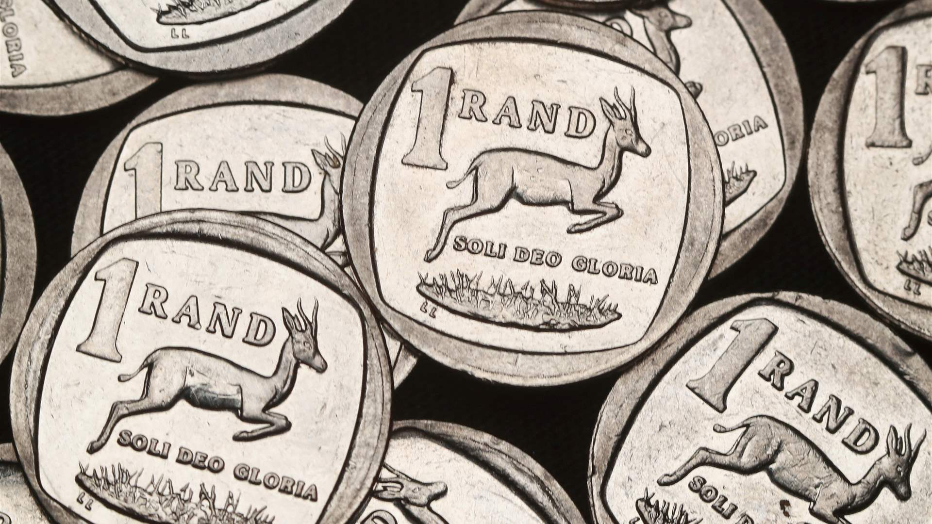South African rand weakens as dollar edges higher
