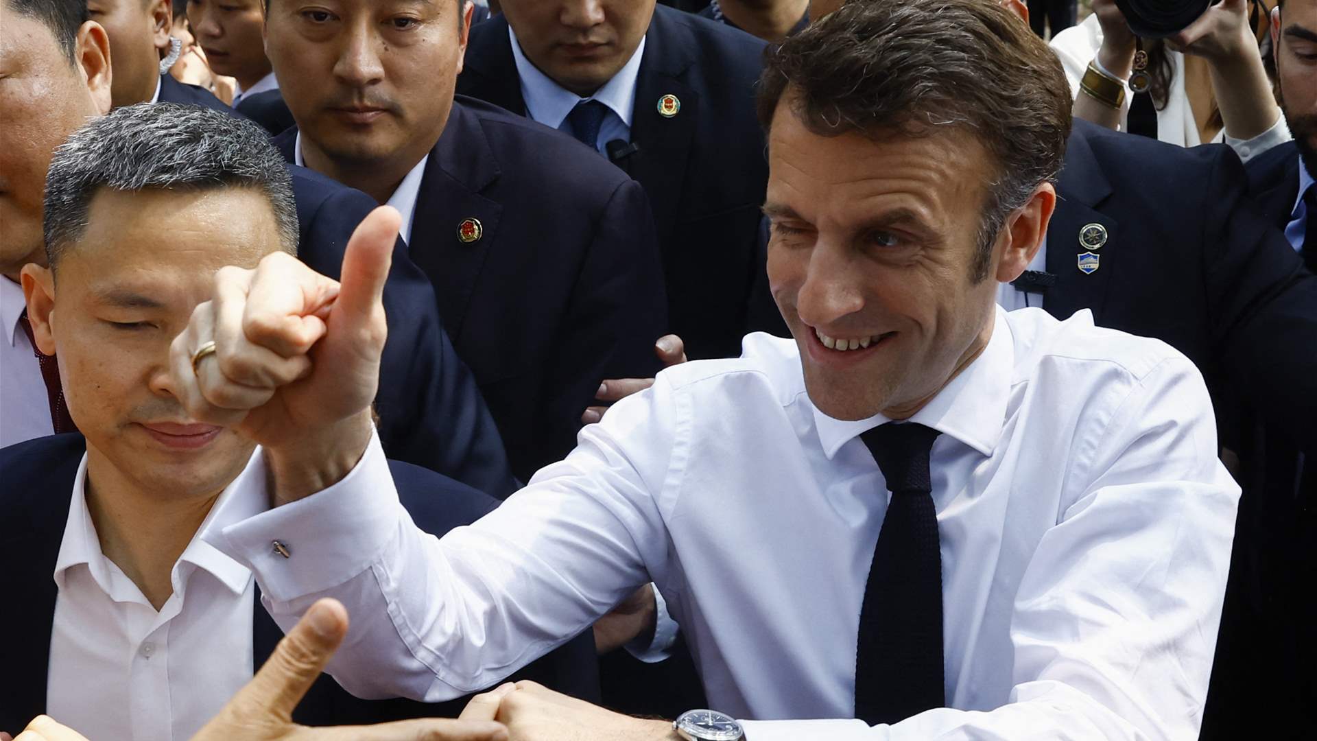 Macron mobbed at university on final day of China trip