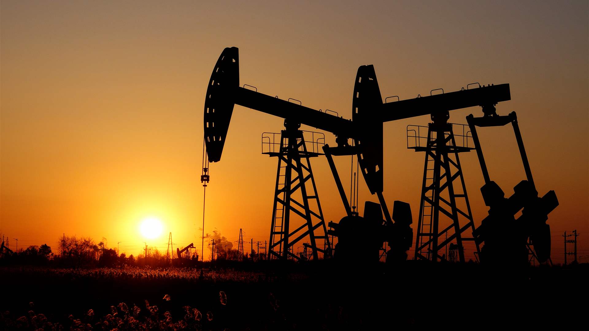 Oil steady as investors weigh tighter supply vs. growth outlook