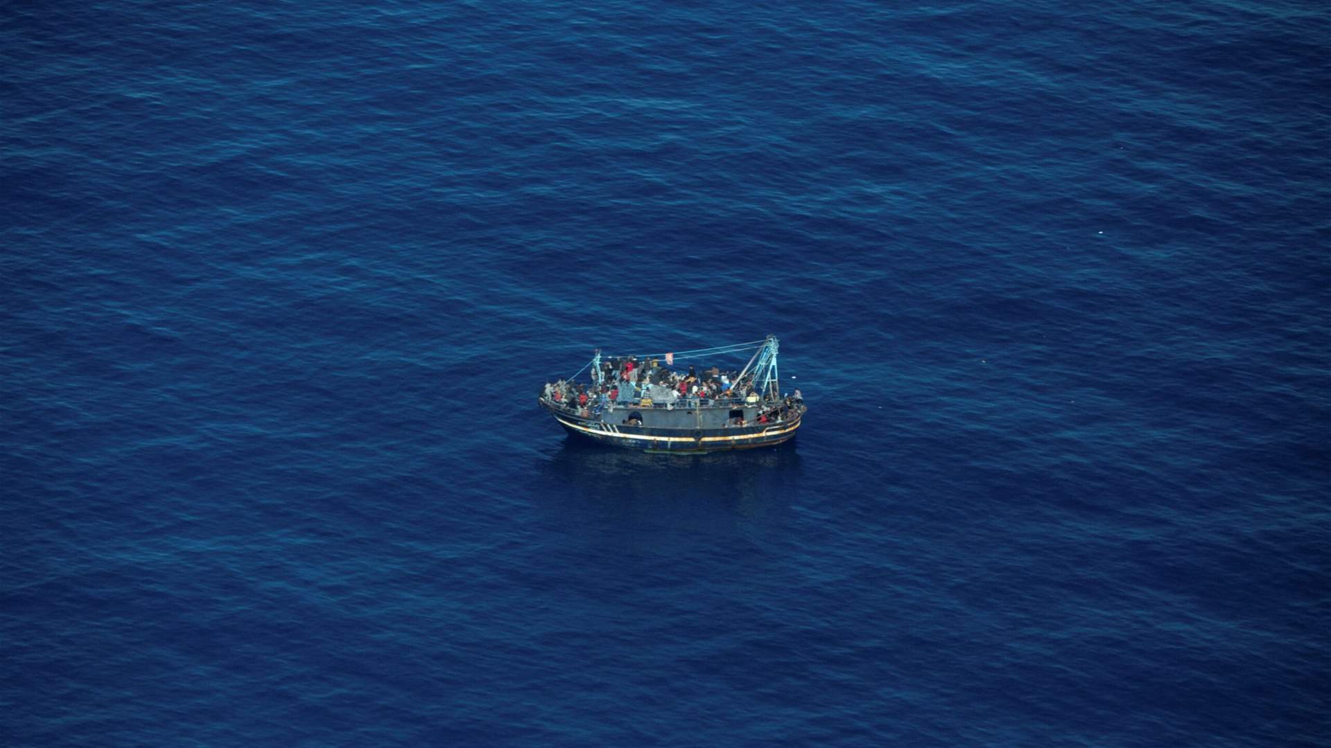 Boat with 400 migrants adrift between Greece and Malta