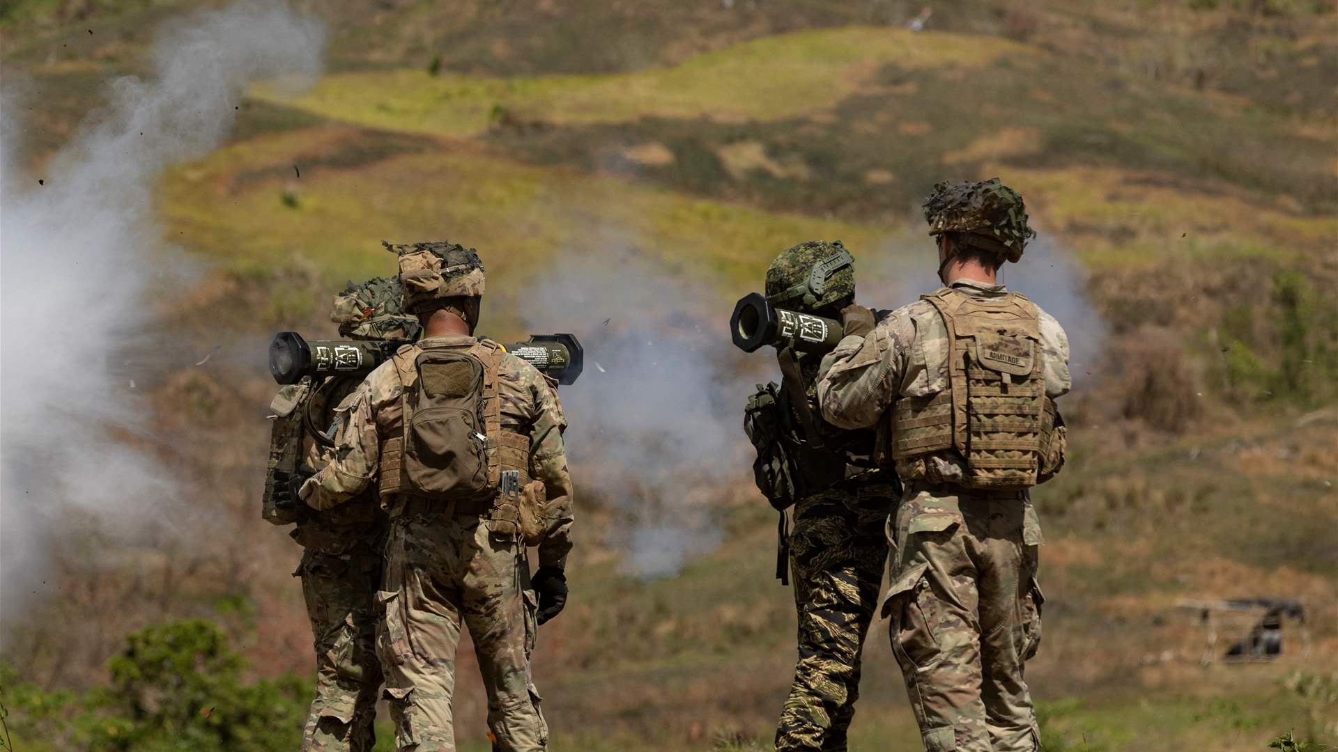 Philippines tells China sites for US military pact not for 'offensive action'