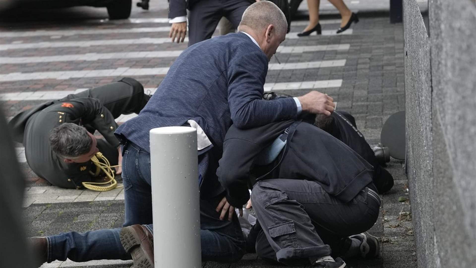 Protesters detained as Macron visits Amsterdam university