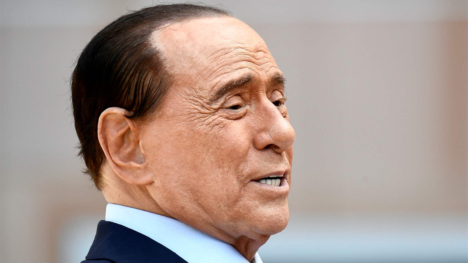 Italy's Berlusconi's health improves, still in intensive care