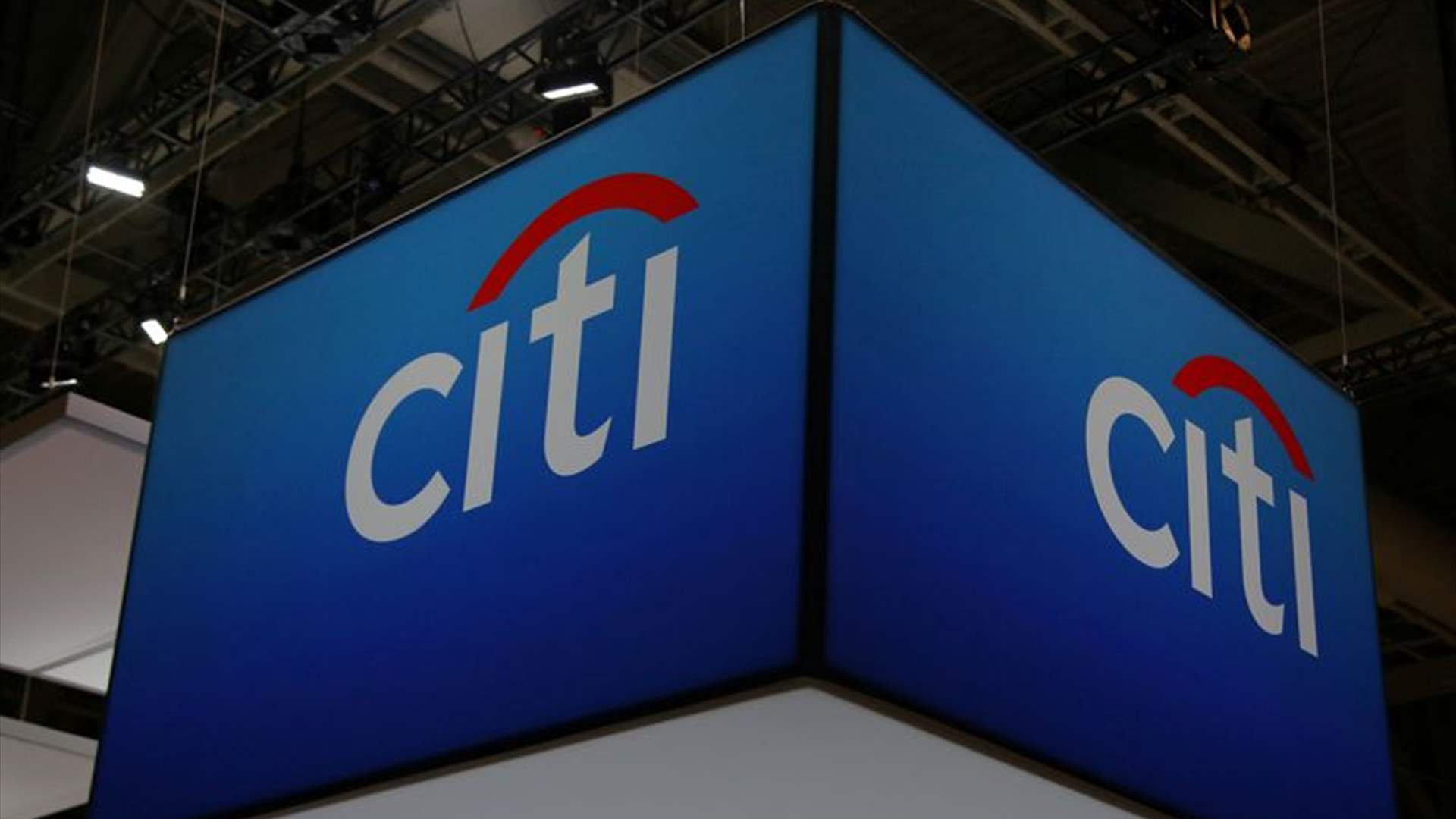 US bank giants ride rate rises, keep storm clouds at bay