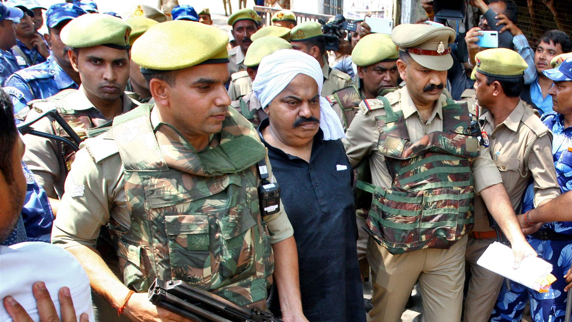 Former Indian lawmaker slain live on TV while in police custody, state restricts gatherings