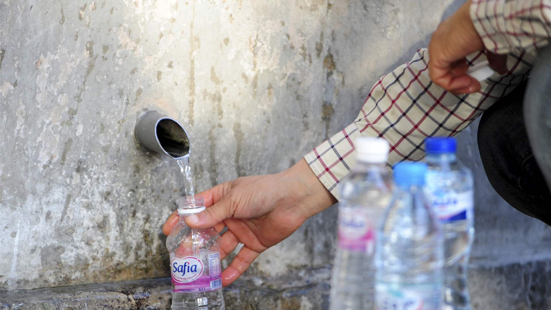 In grim drought, Tunisians ration water in state-ordered ban