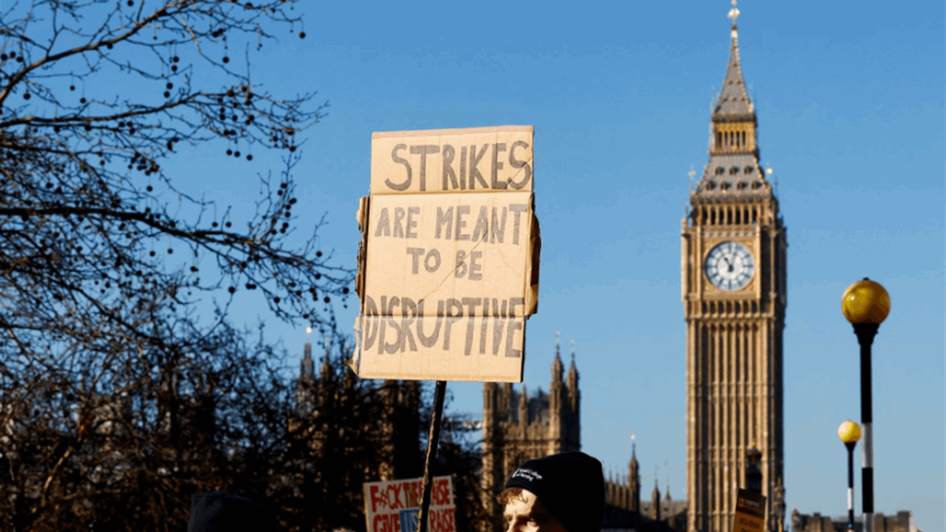 UK curbs nurses' strike after taking legal action against union
