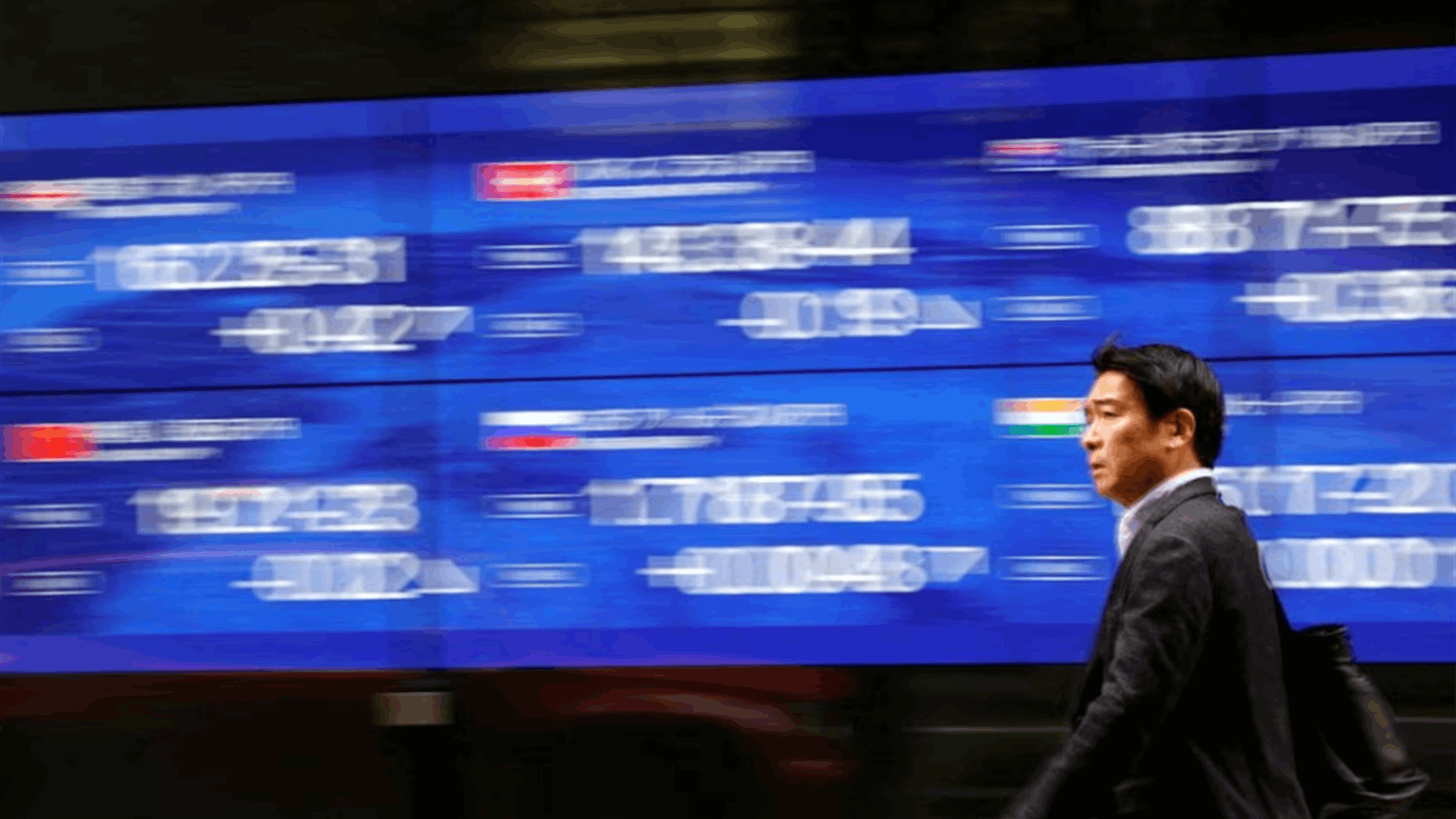 Stocks stuck, Aussie dlr surges after RBA surprise