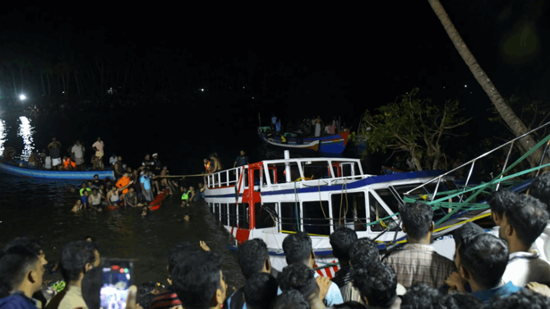 Rescuers search for victims of capsized tourist boat in India; 22 dead