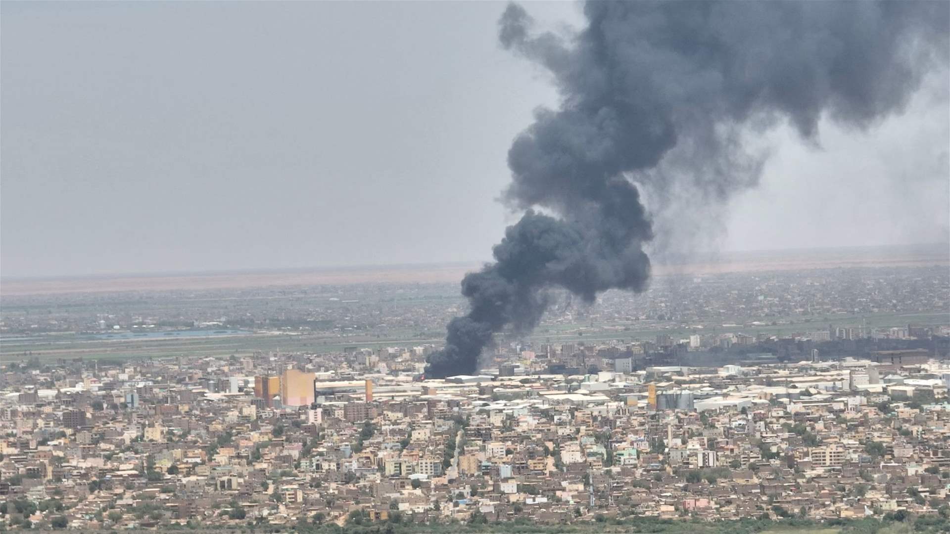 Air strikes pound Sudan's capital as conflict enters second month