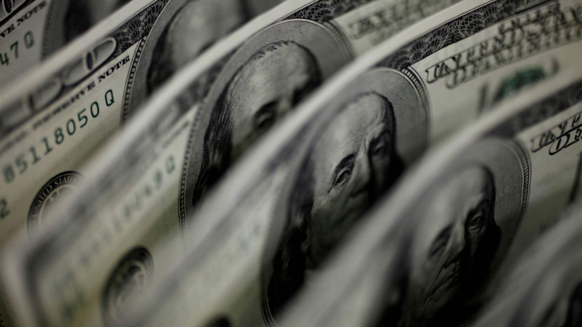 Dollar edges lower after US retail sales data