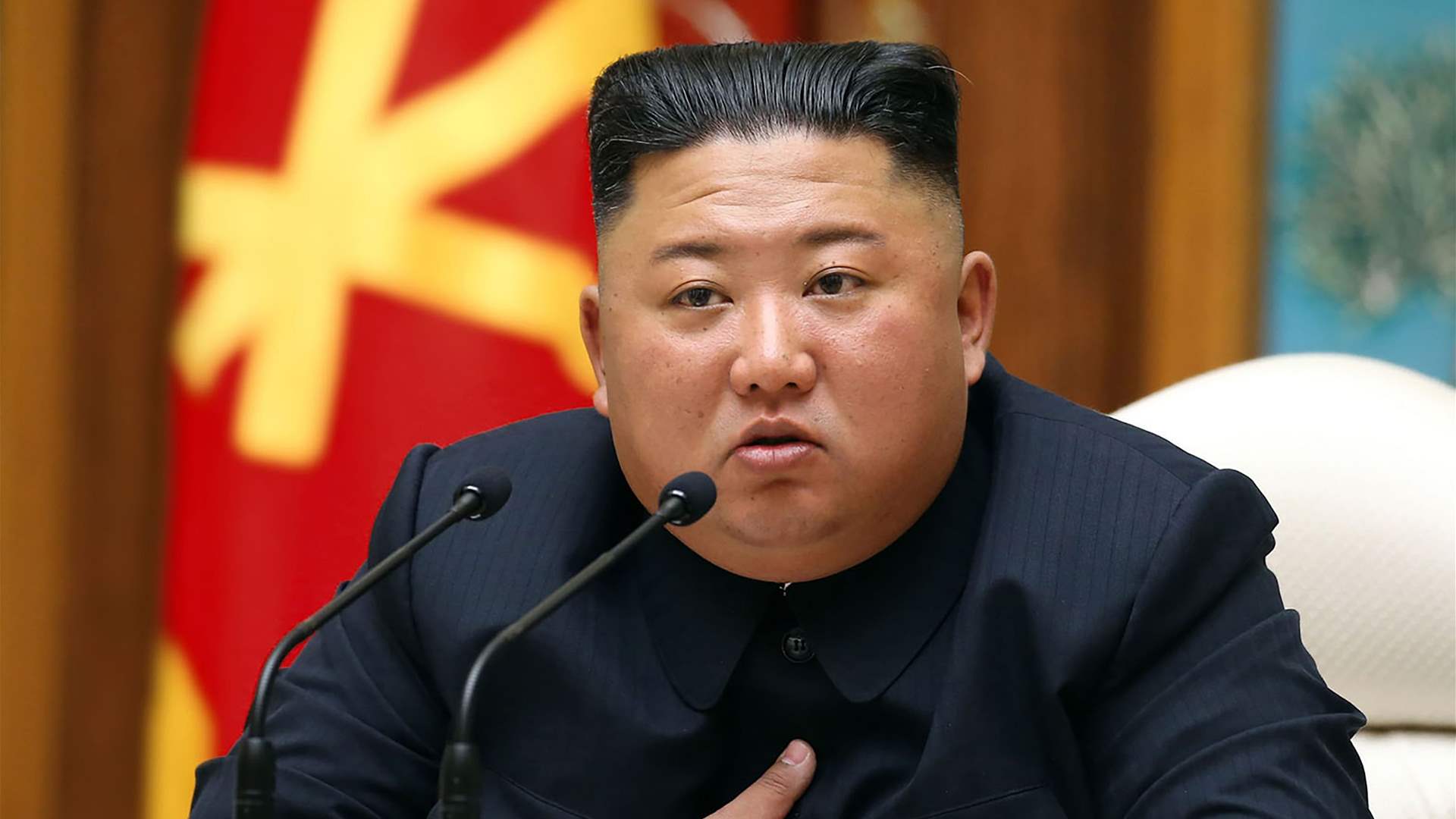 North Korea shows Kim Jong Un examining a military spy satellite that may be launched soon