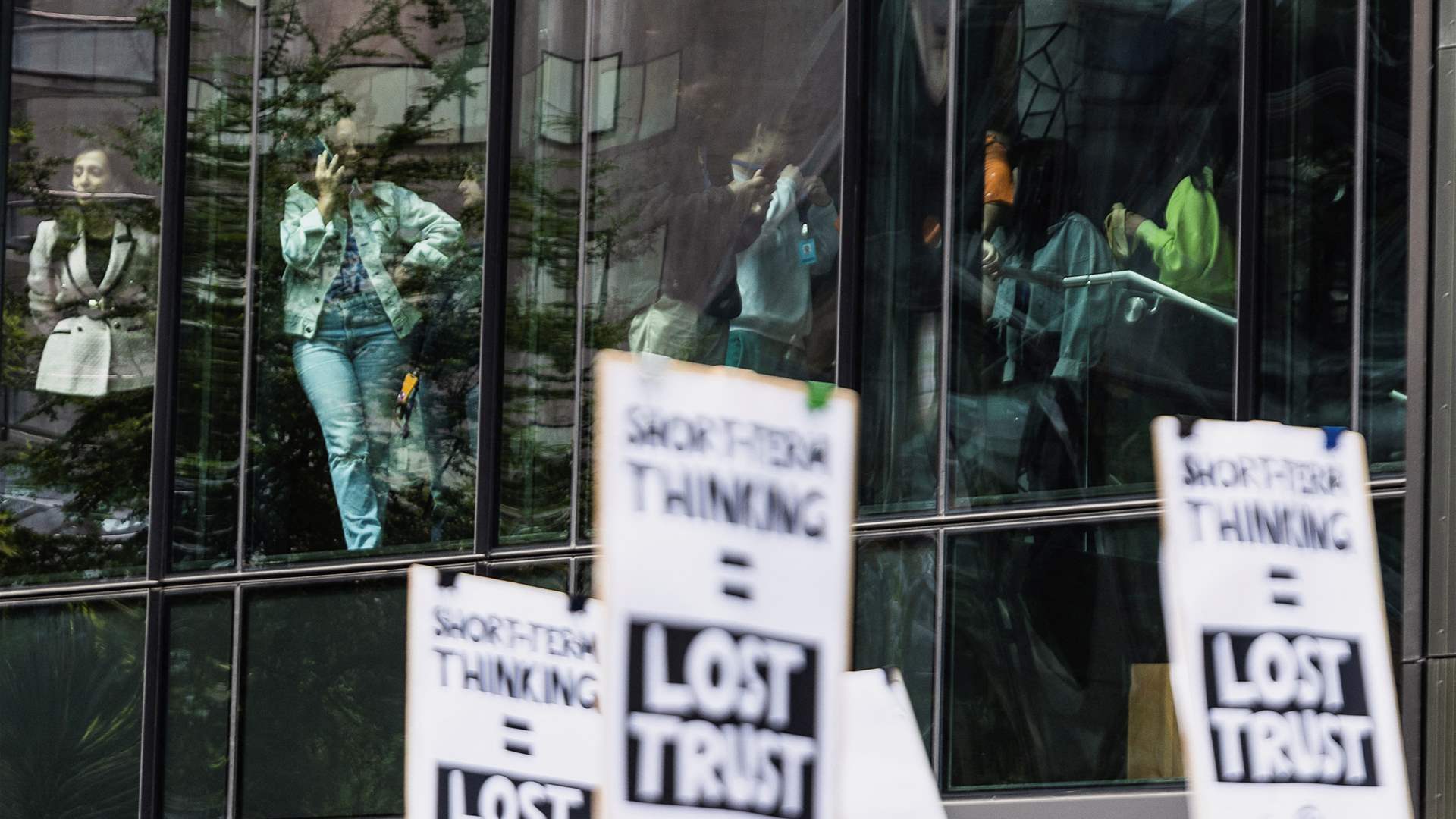 Some Amazon employees walk out in Seattle to protest climate, office policies
