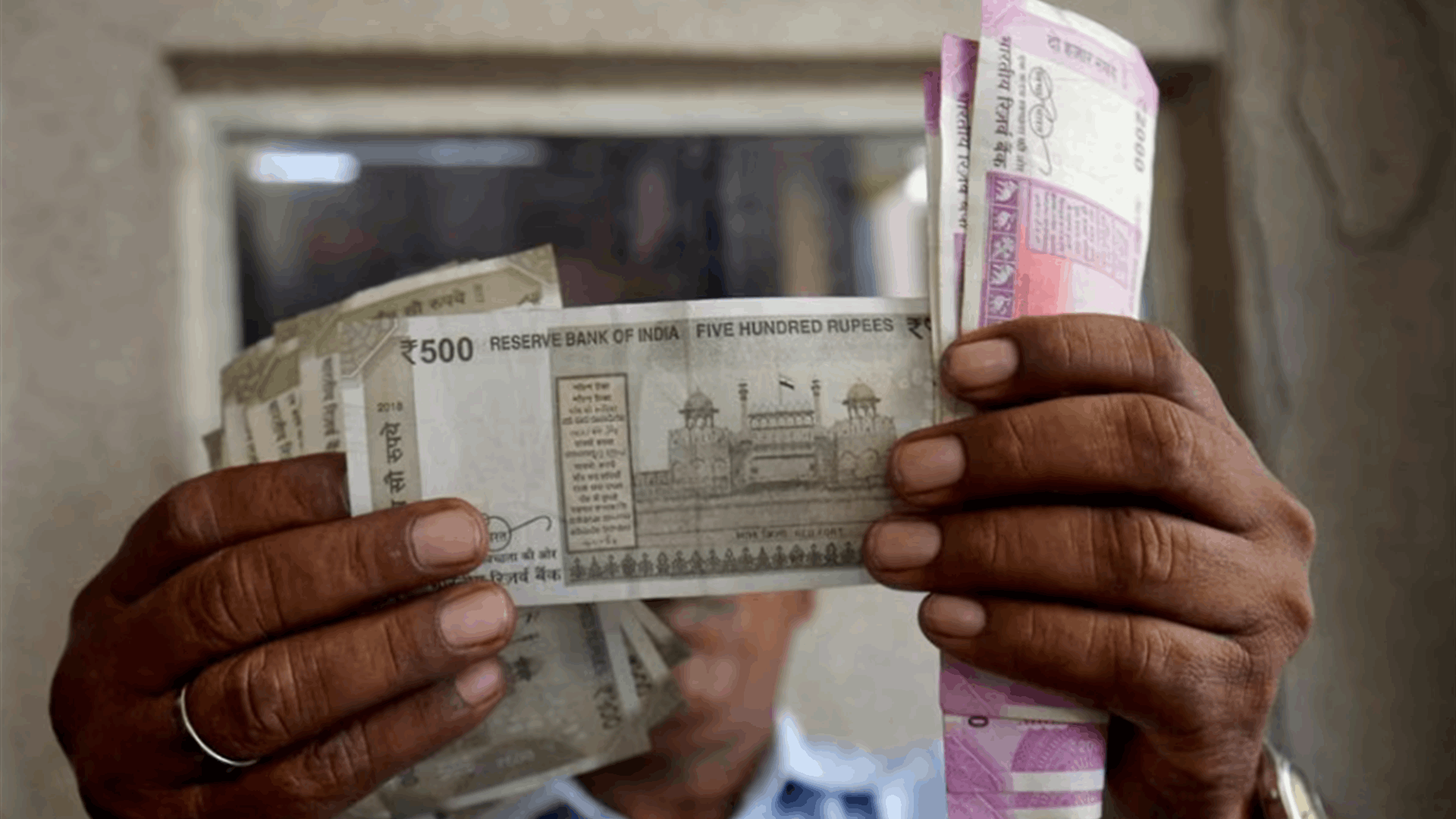 Rupee reaches 2-wk high on weak dollar, eyes US jobs data