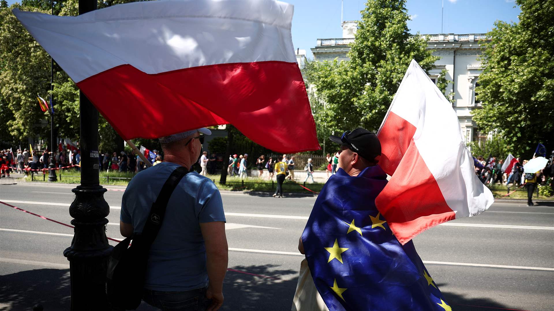Polish opposition supporters, seeking change, mark 1989 Solidarity win