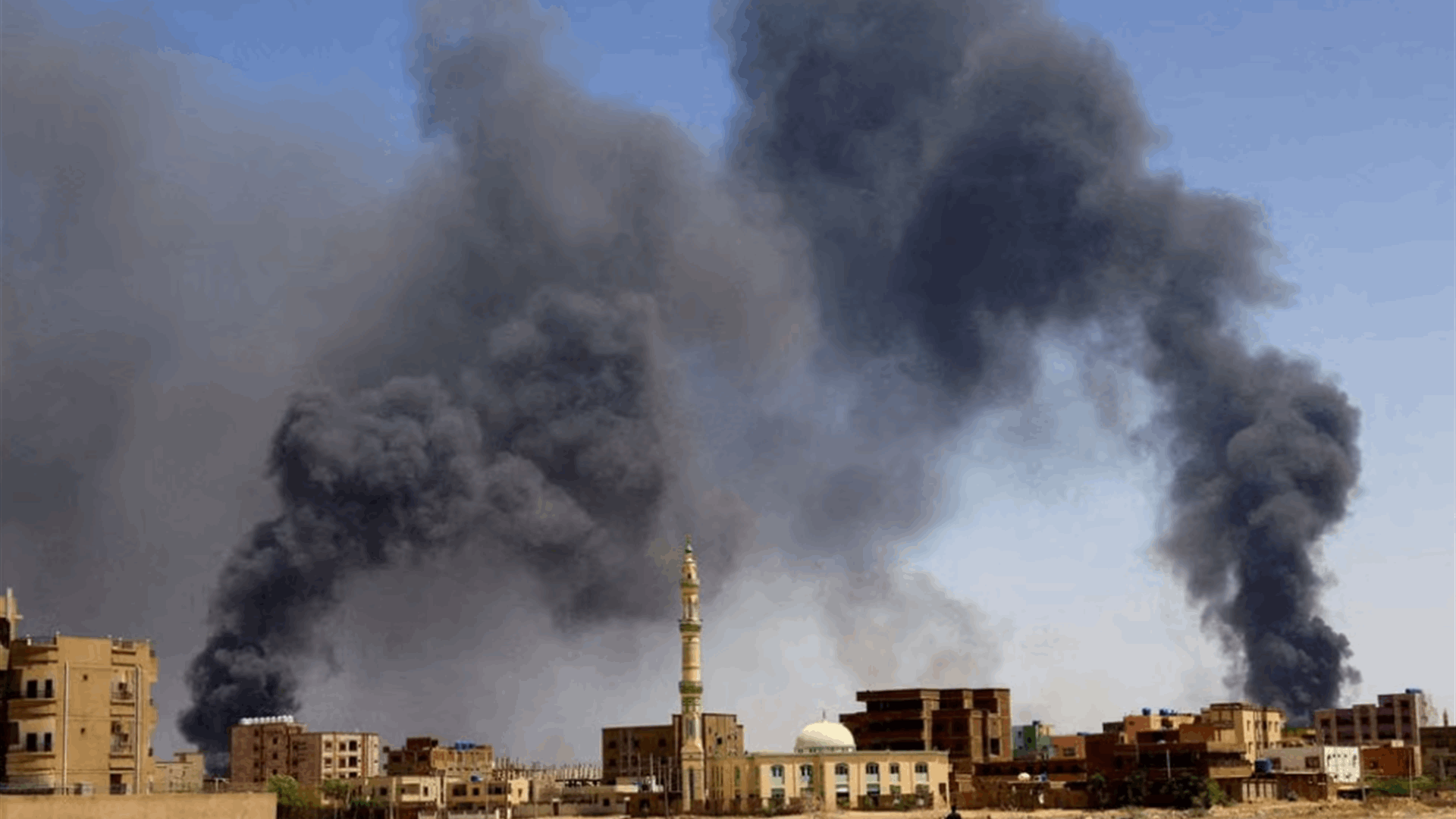 Shelling, looting in Sudan's capital as military factions battle for eighth week