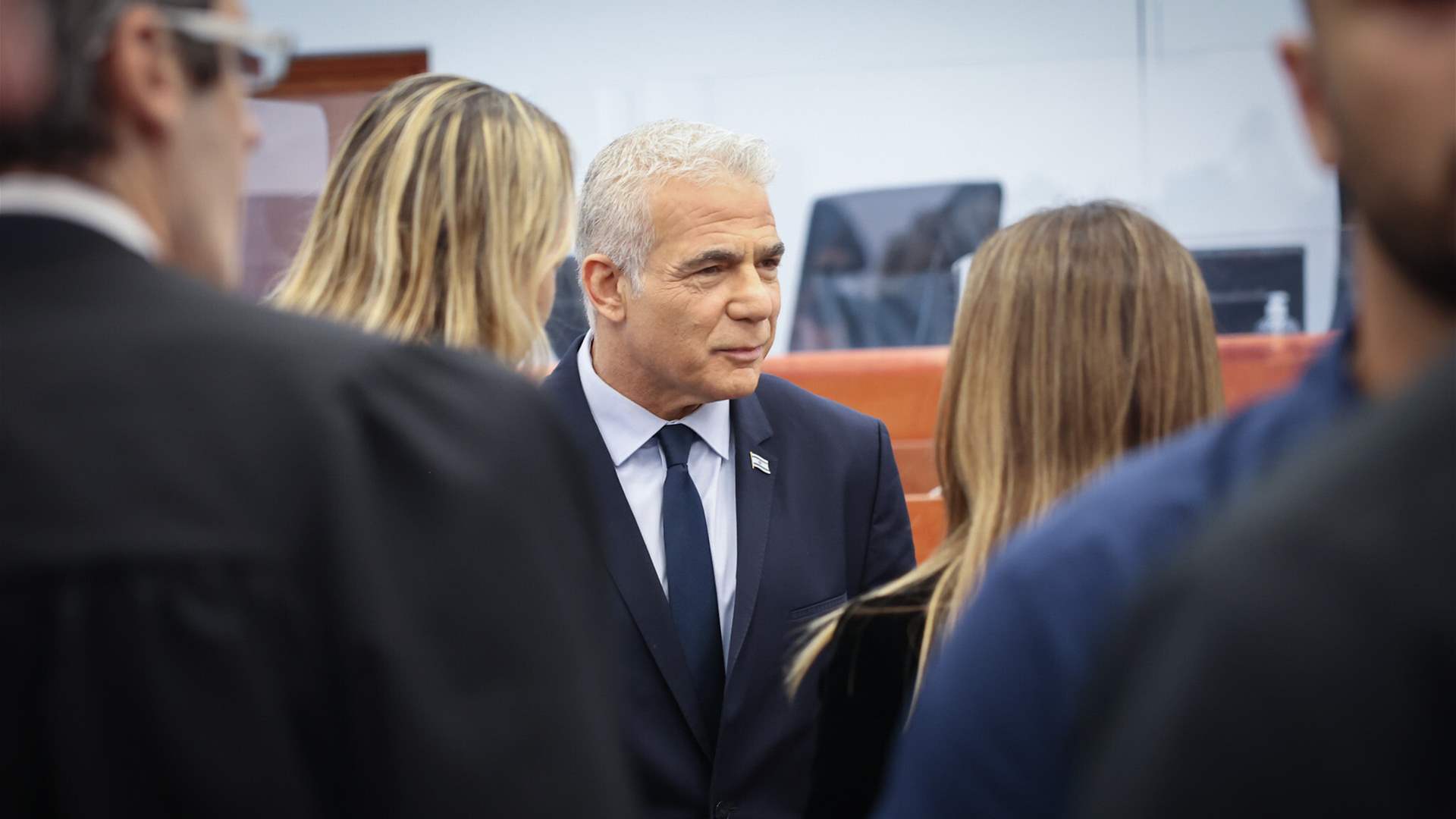 Former Israeli PM Lapid testifies in Netanyahu graft trial