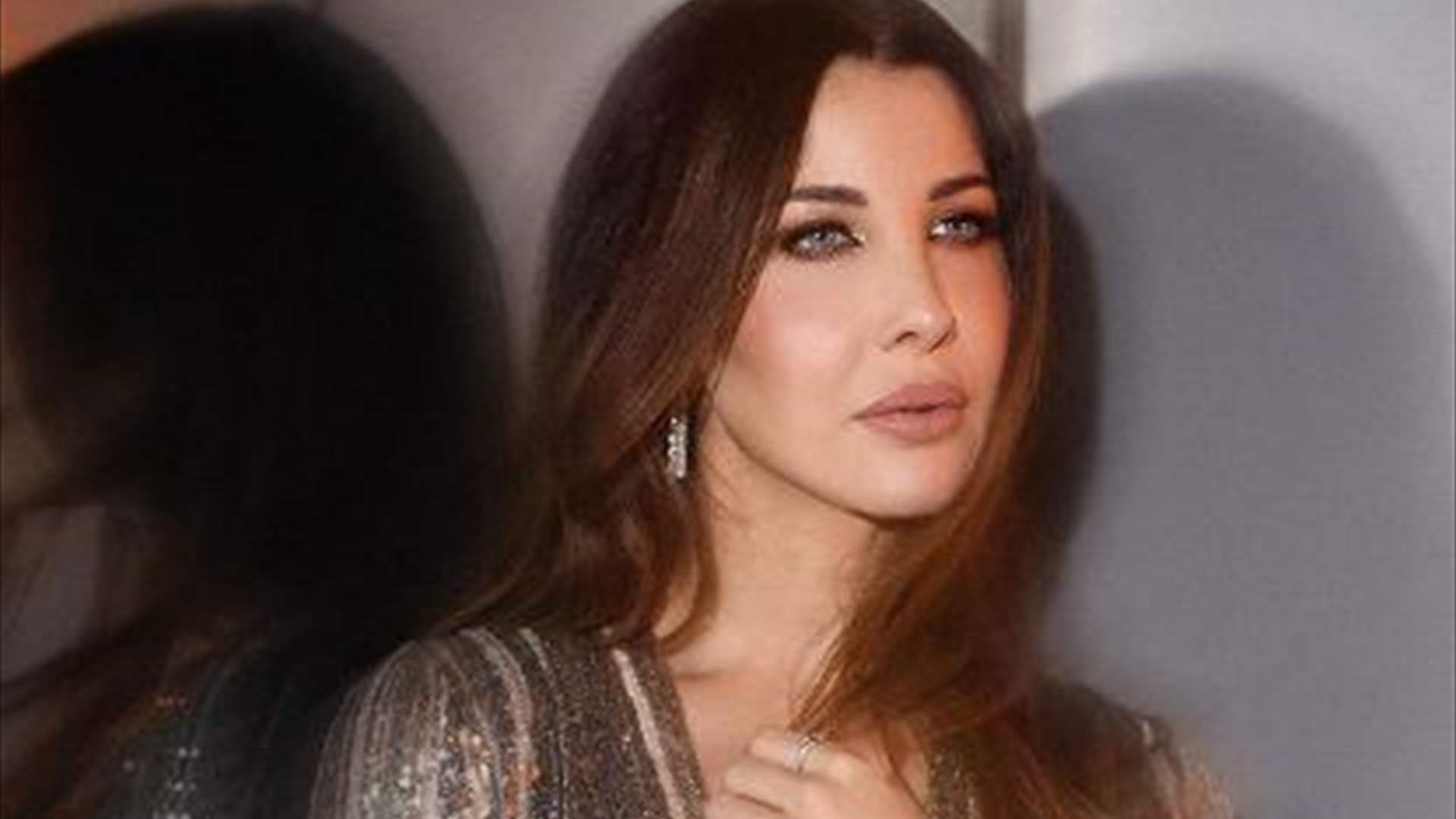 نانسي عجرم في لقطةٍ مميزة مع والدها... هل تشبهه؟