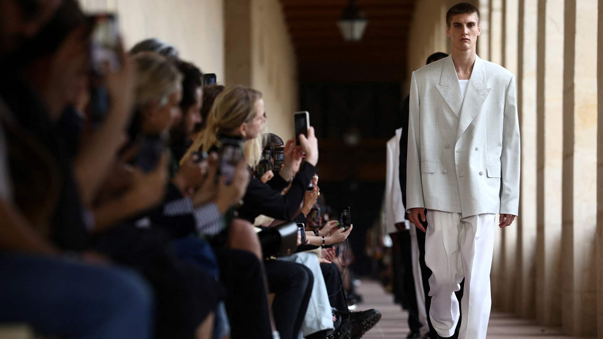 Givenchy offers eclectic mix from military to sharp suits